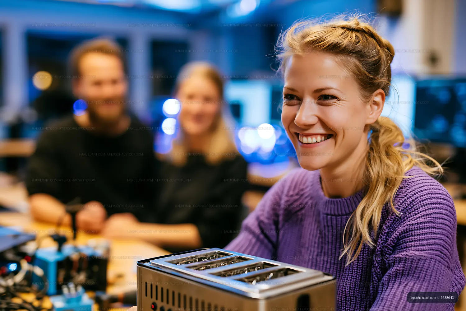 Group of friends working on a project together in a workshop