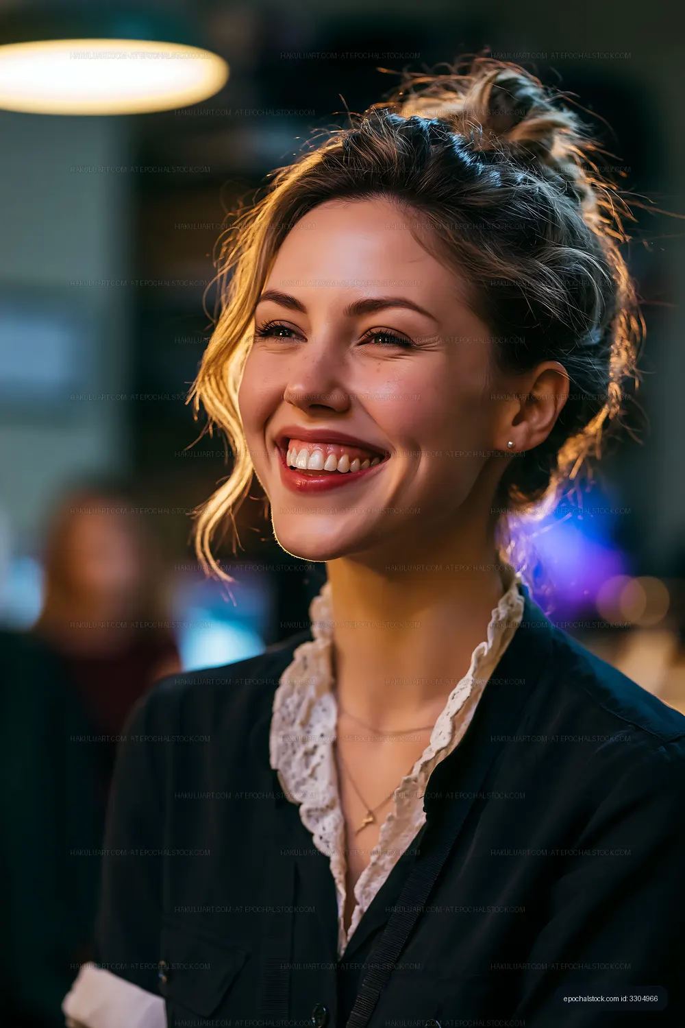 Smiling woman at a cafe in the evening