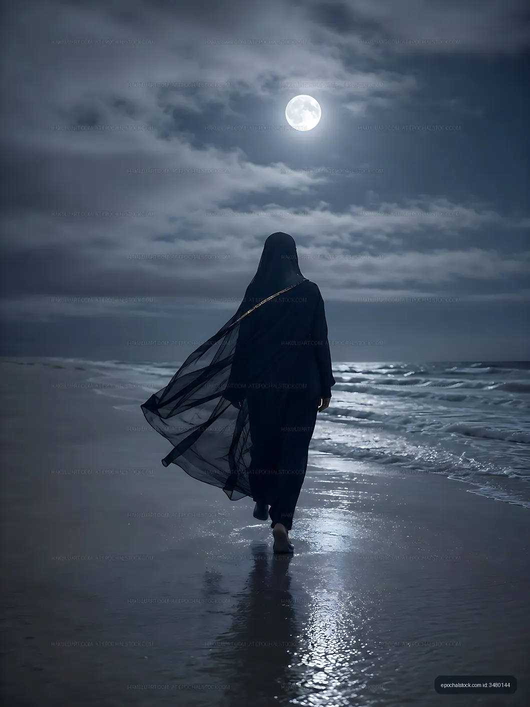 Person walking on the beach at night under the moonlight