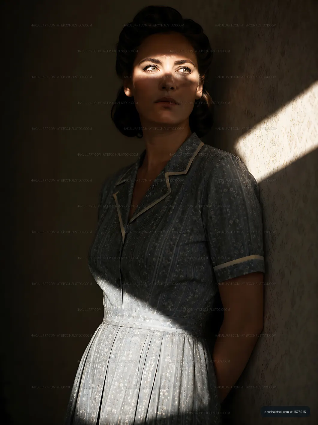 Woman in vintage dress standing near a window with light