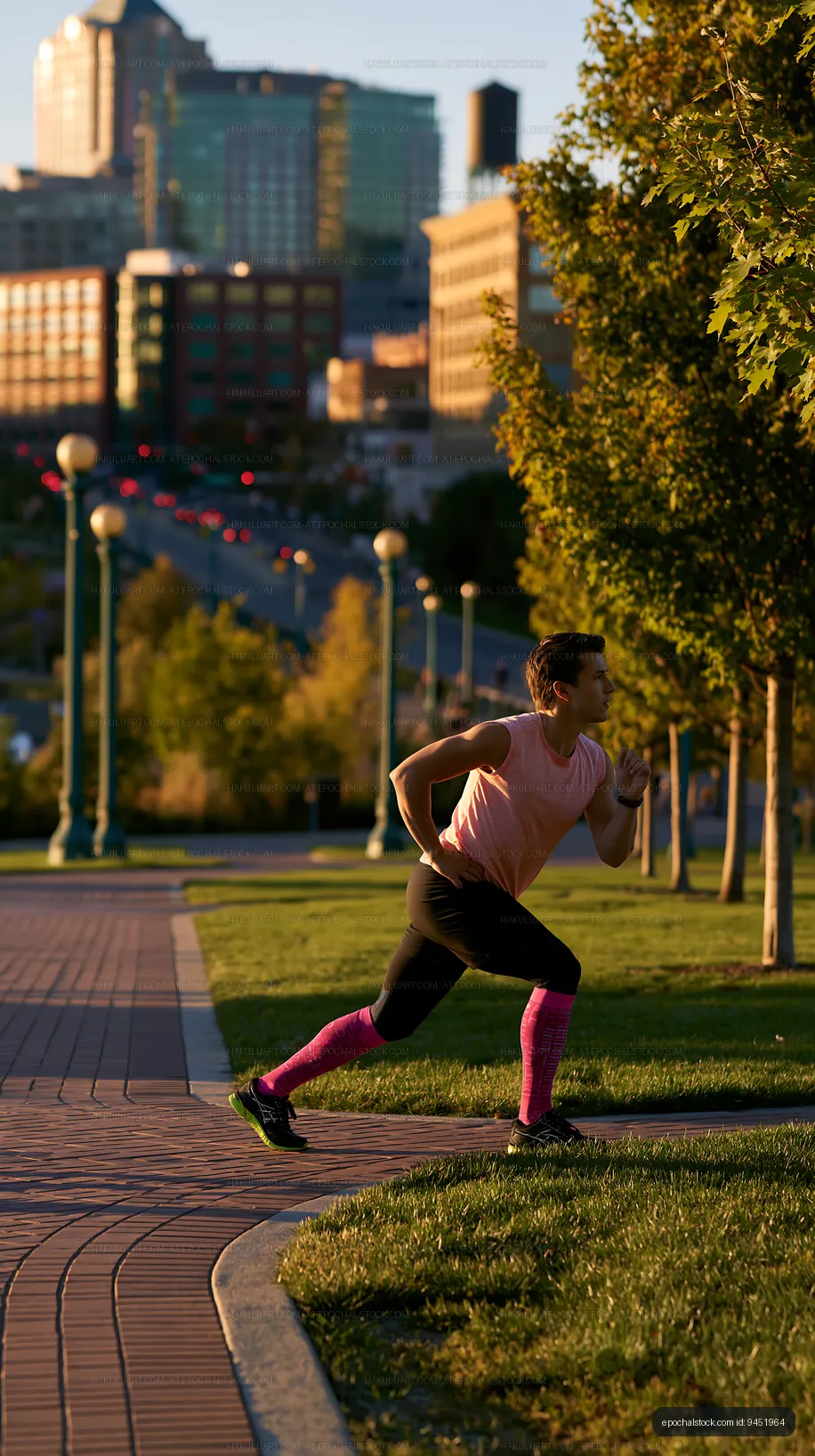 Runner exercising in the city park during the evening