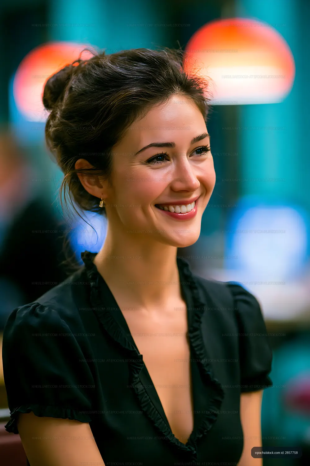 Smiling woman in casual setting with warm lighting