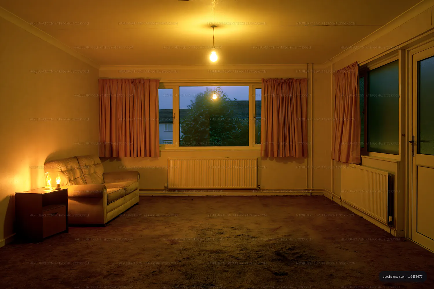 Empty living room with soft light near dusk