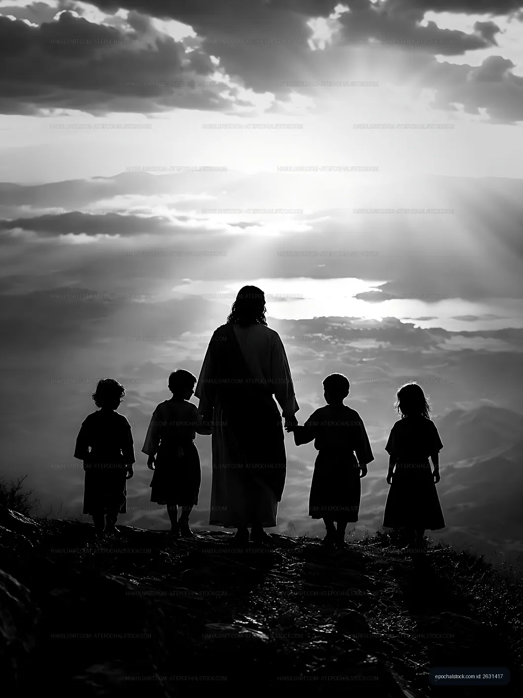 Figures walking hand in hand on a mountain at sunset