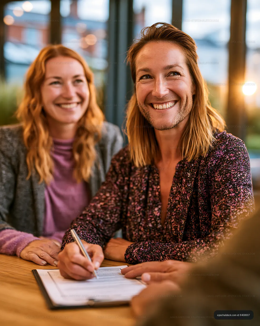 Friendly conversation during a meeting at a modern cafe
