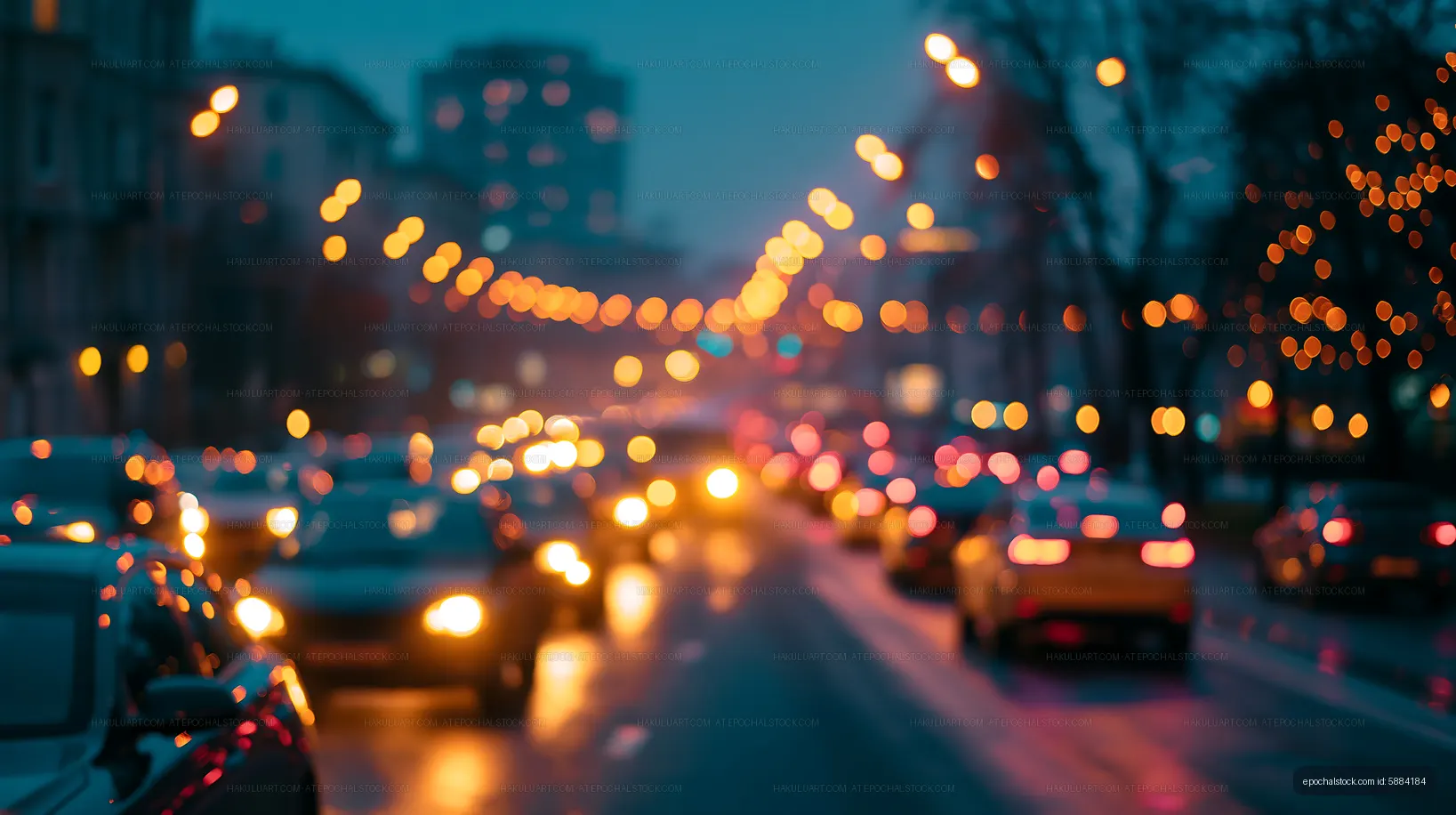 Evening traffic with blurred lights in a city street