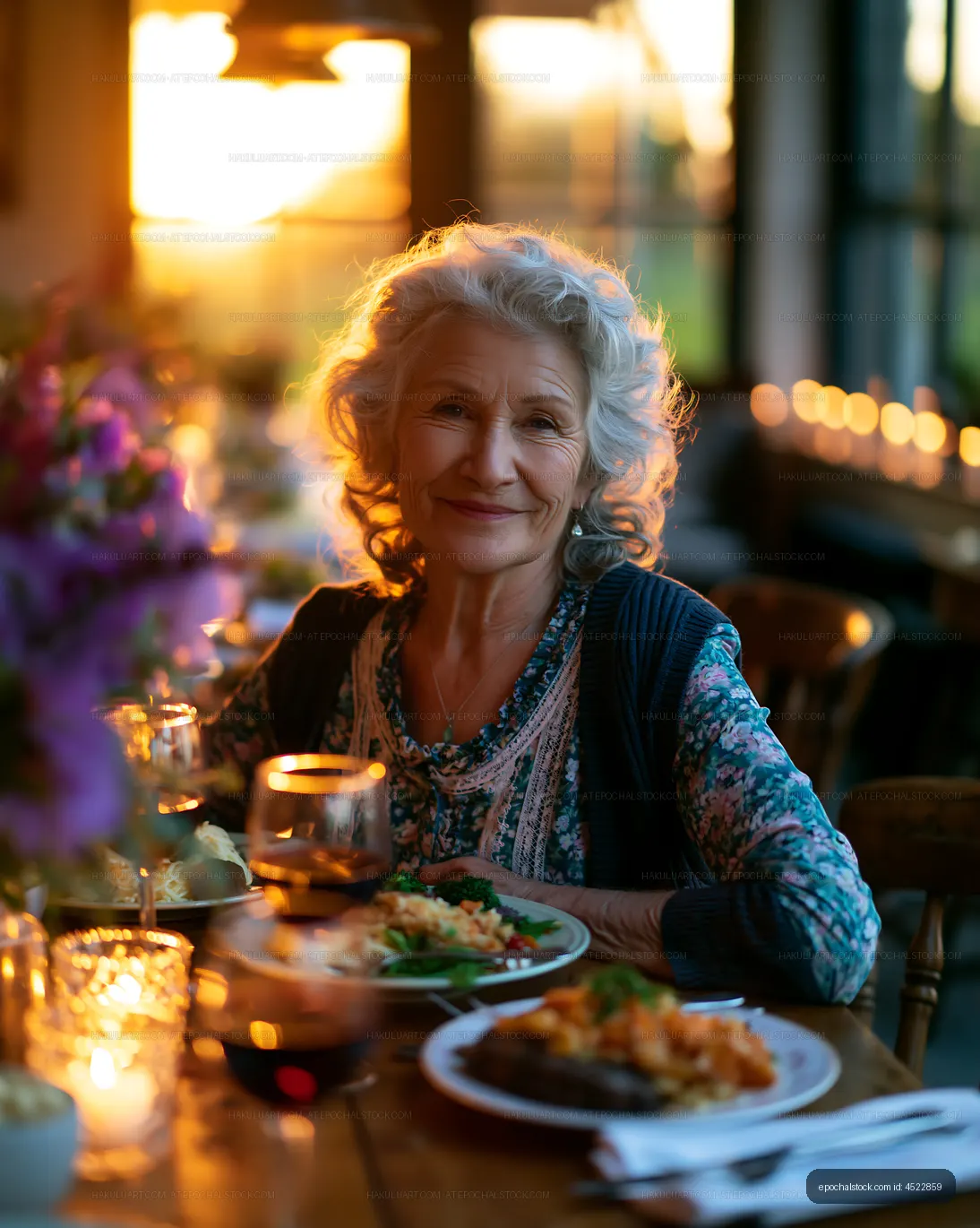 Woman enjoying dinner at sunset in a cozy restaurant