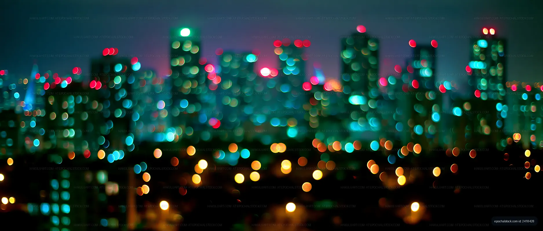 City skyline at night with colorful lights