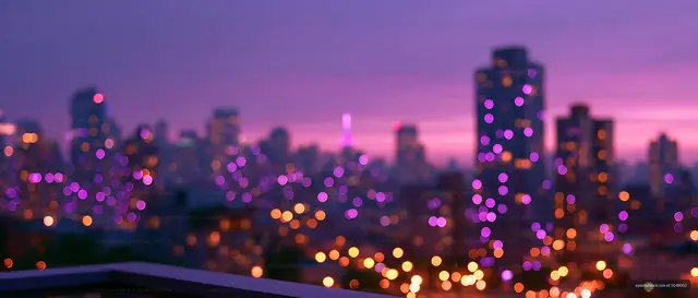 City skyline at dusk with purple lights