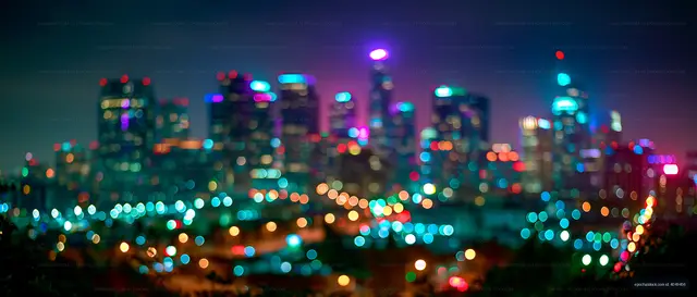 City skyline with colorful lights at night